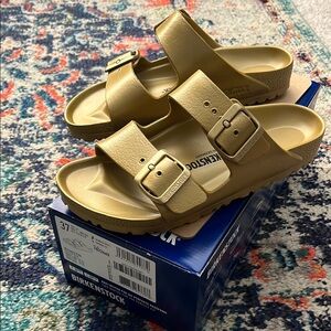 NWT Birkenstock Arizona Eva Sandal in Glamour Gold 
Size 37